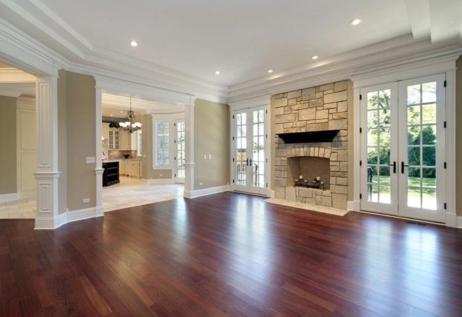 a beautiful polished wood floor in a sunlit room